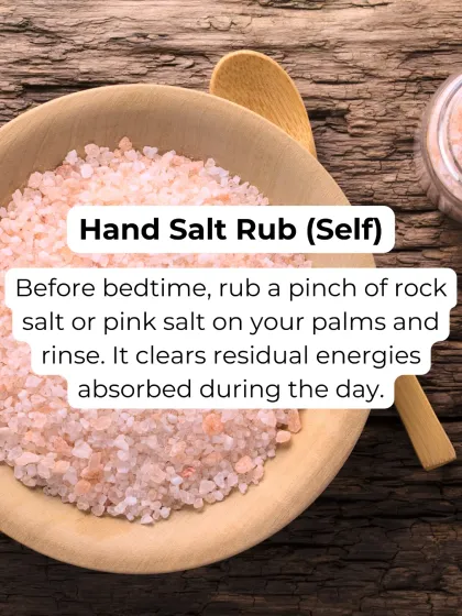 Throughout the day, our hands touch many things and absorb residual energies. Before bed, rub a pinch of rock salt or pink salt on your palms and rinse. This simple hand salt rub clears your energy field for a peaceful sleep.