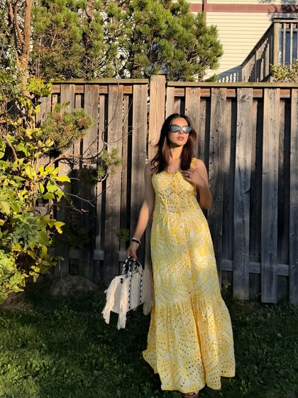 Another full-length shot of the yellow dress, taken from a slightly different angle.