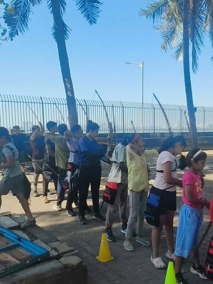 A group of beginner archers learning together. There's a strong sense of community and shared learning in every batch.