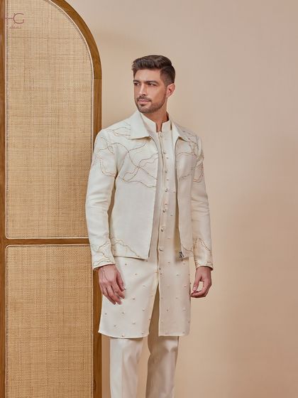I completed the cream kurta set with a matching shacket. The shacket is detailed with delicate, multi-colored threadwork, making it a unique piece you can wear again.