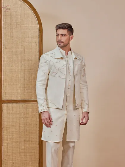 I completed the cream kurta set with a matching shacket. The shacket is detailed with delicate, multi-colored threadwork, making it a unique piece you can wear again.