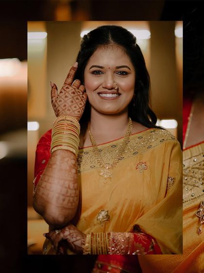 A happy portrait of the bride, Niharika, during her Maharashtrian engagement ceremony.