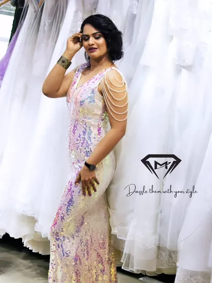 The full-length view of the iridescent sequin gown shows its sleek, body-hugging fit, perfect for a sophisticated and glamorous look.