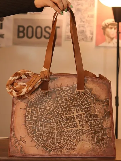 My art isn't just for sneakers. I transformed this beautiful leather tote bag with a hand-painted political map of Lucknow. This project shows how we can turn everyday accessories into deeply personal items that tell a story, in this case, a tribute to a beloved city.