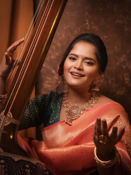 A joyful shot of Sharayu Date during her musical photoshoot, her expression as vibrant as her attire.
