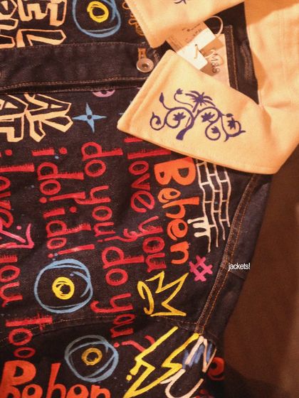 Customizing denim is always fun. This jacket is covered in colorful graffiti-style art, with words, symbols, and patterns that reflect the owner's personality.
