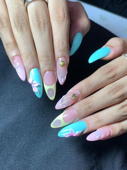 A colorful pastel set with 3D flowers and other unique embellishments, showing my creative range.