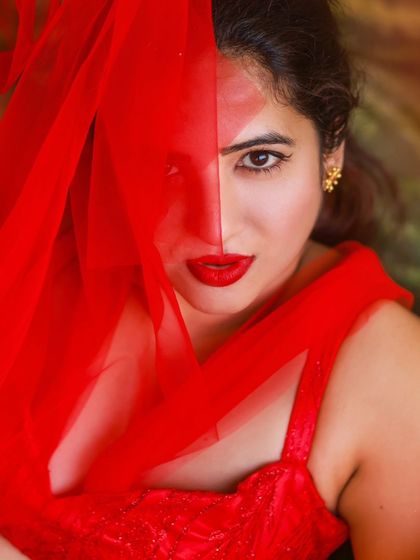 A creative and vibrant summer-themed shoot with an actress in a red outfit surrounded by watermelons. This series is playful and colorful, perfect for a brand campaign or a unique portfolio piece.