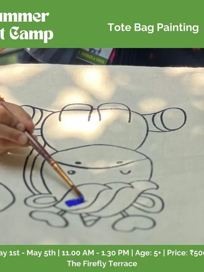 Tote bag painting is always a hit at our summer camps. This image shows a child carefully filling in a fun design, creating a piece of usable art they can take home and show off.