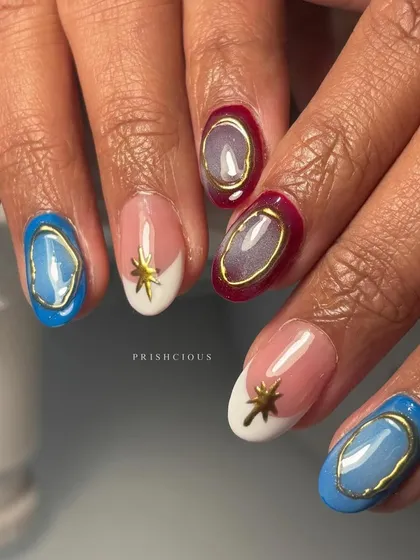A closer look at the star and gemstone nails. I love combining different textures and finishes like this.