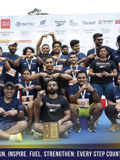 The power of community. Our entire running squad gathers for a group photo at the Dream Runners Half Marathon in Chennai, celebrating a successful event together. We train as a team and we win as a team.