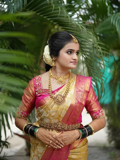 Another beautiful portrait of the bride. The makeup is designed to enhance her features naturally, creating a look that is both glamorous and authentically her.