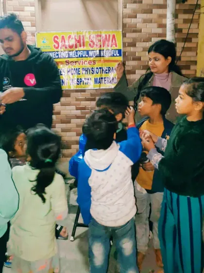 Winter brings its own challenges, and our *Sachi Sewa* team steps up to help. Here, we are distributing warm mufflers to children, bringing a little warmth and comfort during the cold nights.