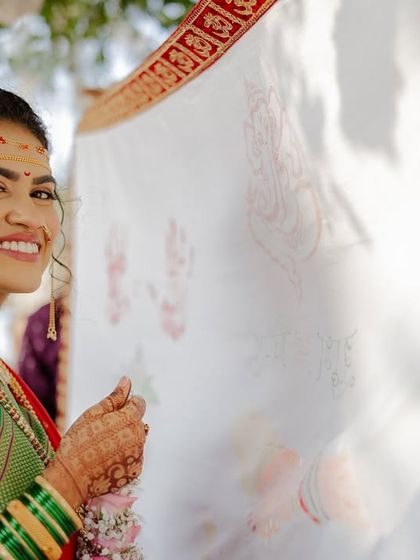 The 'antarpat' moment, a peek of the bride's happy and excited face.