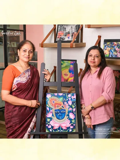 Another proud moment with a student and her gorgeous painting of Shrinathji, showcasing the detailed work and vibrant colors she mastered.