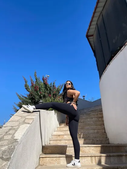 Taking my stretches to the stairs. You don't always need a mat to move your body and feel good.