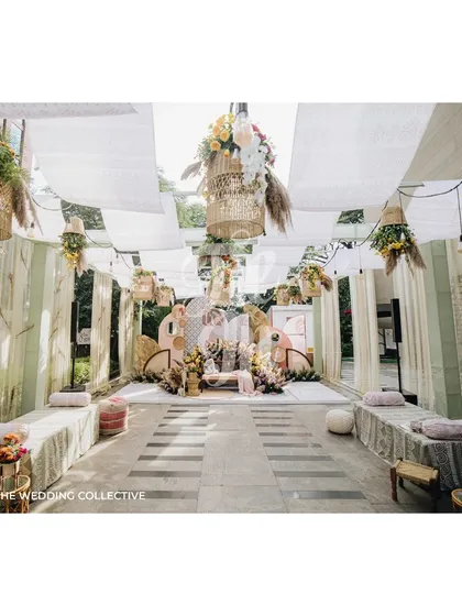 This outdoor Mehendi ceremony captures a relaxed, boho-chic aesthetic perfect for a sundowner event. We combined informal lounge seating with flowing drapes and hanging floral baskets to create a space that is both stylish and comfortable, showcasing our versatility for different event styles.