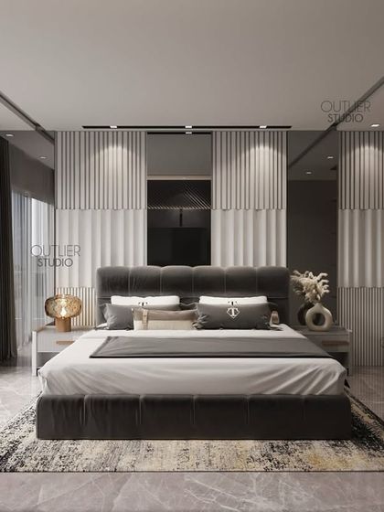 Another view of a stylish retreat. This bedroom uses a monochrome color scheme with a textured white headboard wall, a dark bed frame, and large windows that let in plenty of natural light.