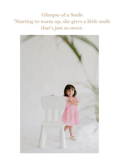 As she starts to warm up, we get the first glimpse of a sweet, gentle smile. We never rush children; we wait for their true personalities to emerge naturally.