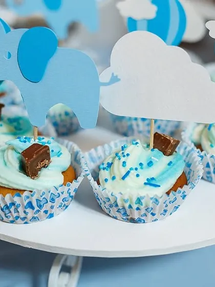 These adorable blue-themed cupcakes with elephant toppers are perfect for a baby boy's shower. This image highlights my ability to create customized, themed desserts that add a personal touch to your event.