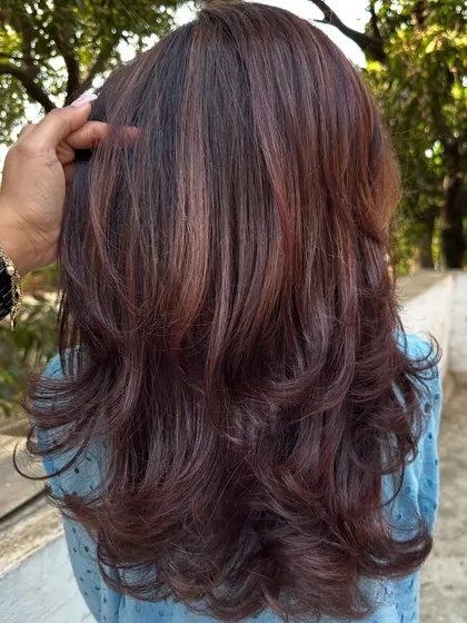 A beautiful blend of 'Mahogany & Plum'. The deep red of the mahogany and the cool tones of the plum create a unique, multi-faceted color that looks different in every light.