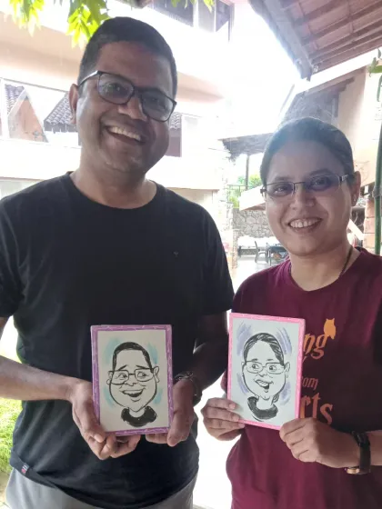 This couple opted for individual caricature portraits. It's a fun activity for guests at parties and get-togethers.