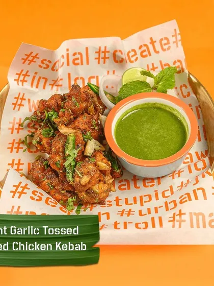 My Burnt Garlic Tossed Spiced Chicken Kebab is a crowd favourite. I toss tender chicken pieces in a special spice mix and finish them with burnt garlic and fresh herbs, served with a tangy mint chutney. It's a perfect starter with a punch of flavour.