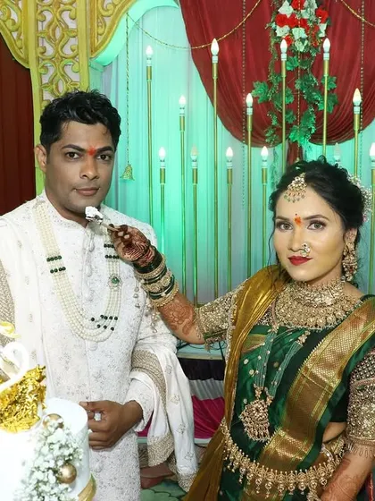 The bride feeds the groom a piece of their engagement cake, a lovely tradition we are always happy to witness.