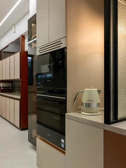 The appliance nook in use, with a kettle ready for a cup of tea. It’s these small, thoughtful corners that make a home feel truly lived-in and designed for real life.