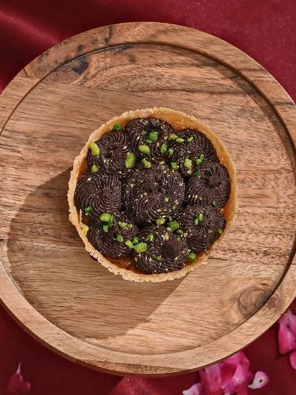 A classic with a chocolaty twist. My chocolate ghewar is for those who love to blend tradition with temptation.