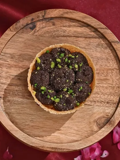 A classic with a chocolaty twist. My chocolate ghewar is for those who love to blend tradition with temptation.