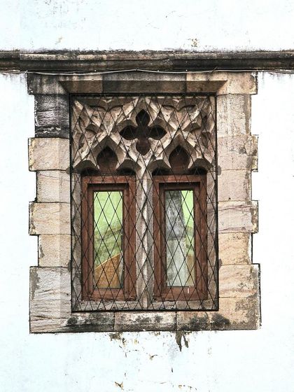 An intricately carved stone window, showcasing the incredible craftsmanship of a bygone era.