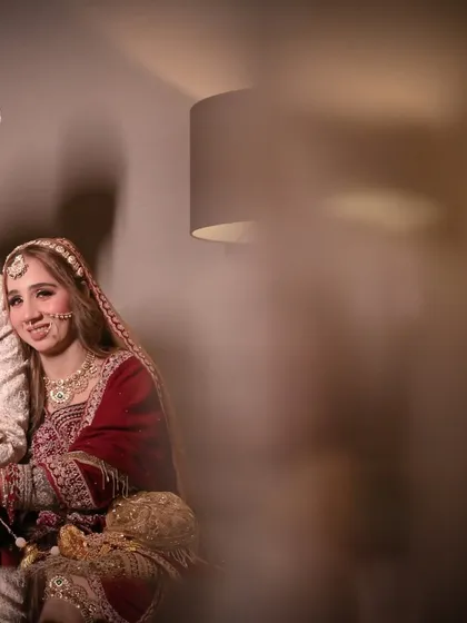 A candid portrait of the couple sharing a quiet moment together during their reception. I used a foreground element to create a sense of intimacy, as if we are peeking into their private world.