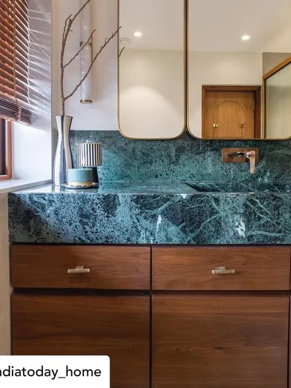 Our "Bold & Balanced" home was published in India Today Home. This feature showcased the luxurious master bathroom, highlighting the use of green marble and custom woodwork.