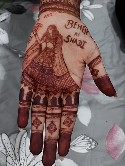 The "Behen ki Shaadi" design after the henna has dried and the stain has developed. The color is rich and beautiful.