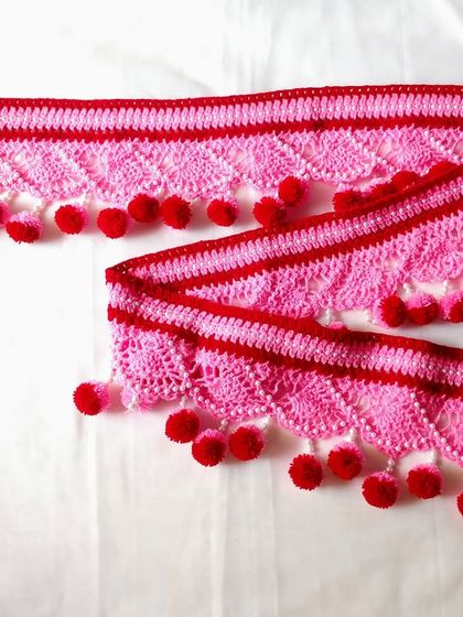 I was so excited to make this custom 7-foot long toran in pink and red. It shows how I can adapt my designs for larger spaces.