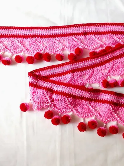 I was so excited to make this custom 7-foot long toran in pink and red. It shows how I can adapt my designs for larger spaces.