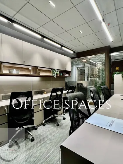 Here is a clear view of an open-plan workstation area from one of our office projects. The design features sleek linear lighting, ample overhead storage, and ergonomic seating to create a workspace that is both productive and comfortable for the team.