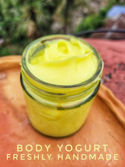 A close-up of the Fresh Lime Body Yogurt. You can see how creamy and smooth it is. It's packed with benefits like tan removal and a refreshing fragrance.