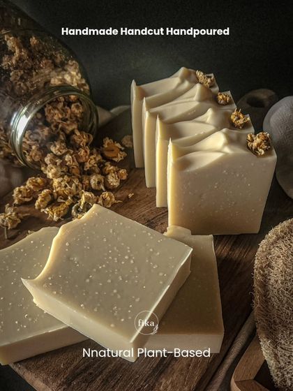 Experience tranquility in every wash with my Chamomile Dream Soap Bar. I infuse extra virgin olive oil with sun-dried chamomile flowers and blend it with shea butter for a deeply nourishing and soothing experience.