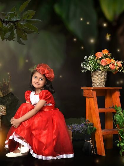 An enchanting forest portrait for a fifth birthday. The magical lighting and rich colors create a storybook scene for this beautiful girl.