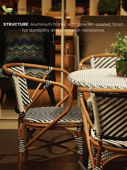 A detail shot of our black-and-white dining chair, focusing on the structure. The frame is powder-coated aluminum, ensuring durability and resistance to corrosion, even in outdoor conditions.