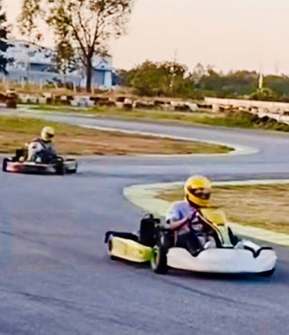 Two Rotax karts navigating one of the track's many challenging turns. It's the perfect machine for those who want to find the perfect racing line.
