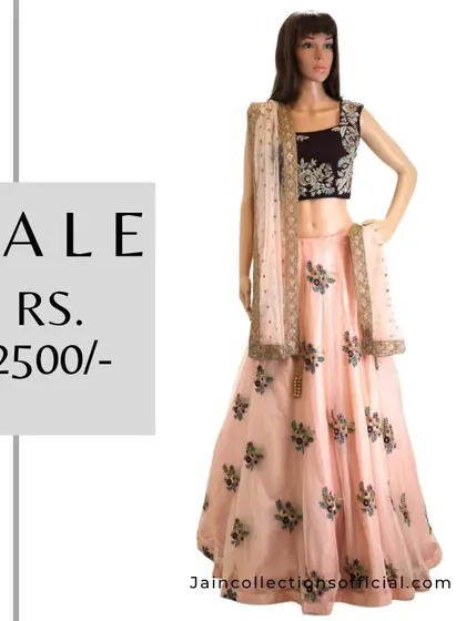 A lovely peach lehenga with a contrasting dark blouse, available to buy for only Rs. 2500 in our sale.