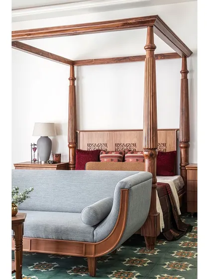The master bedroom suite in Prangan, featuring a massive four-poster bed and custom furniture, was designed to be a luxurious and regal retreat.
