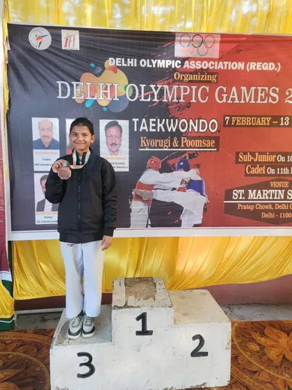 My student Gargi on the podium after winning a bronze medal at the Delhi Olympic Games 2024.