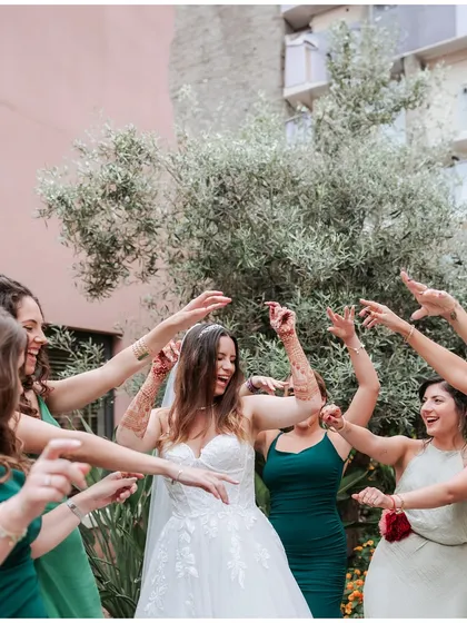 The bride and her tribe dancing with abandon. We love capturing these moments of pure, uninhibited joy.