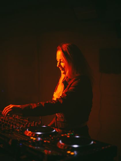 A smile while I'm mixing. I genuinely love what I do, and I think that energy translates to the dance floor.