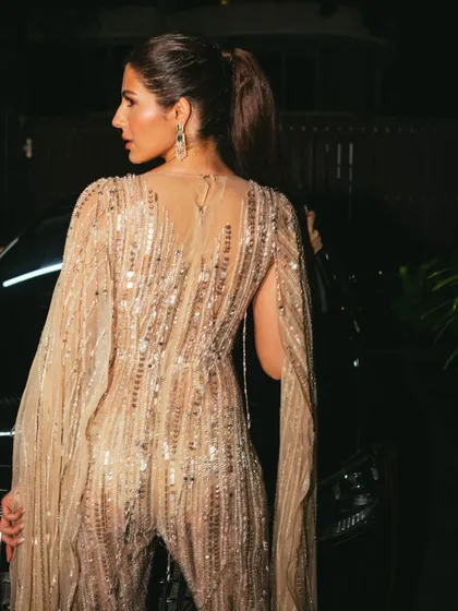 Styling the beautiful Elnaaz Norouzi for an awards show. This sheer, glittering jumpsuit is a perfect example of red carpet glamour, designed to make a statement and shine in the spotlight.