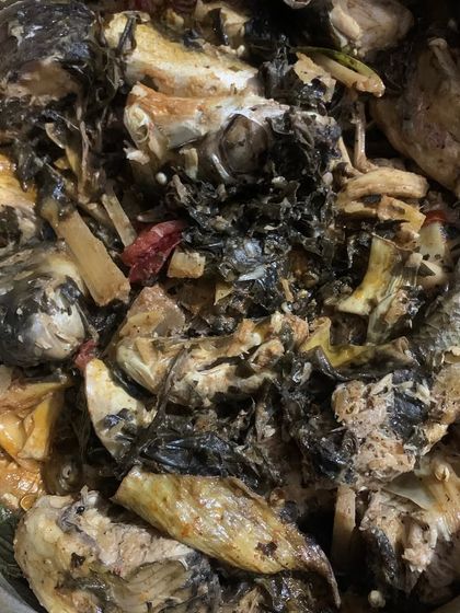 A pot of mixed river fish cooked in the traditional Pongsen style.